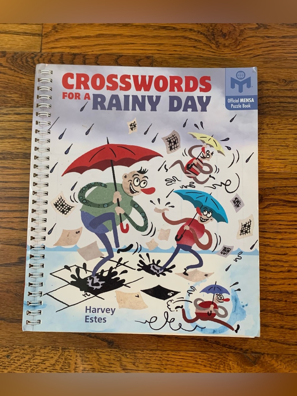 Crosswords for a Rainy Day NWOT
Official MENSA Puzzle Book
96 Pages
Spiral Ring